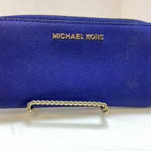 Michael Kors Zip Around Wallet. Blue leather with gold trim